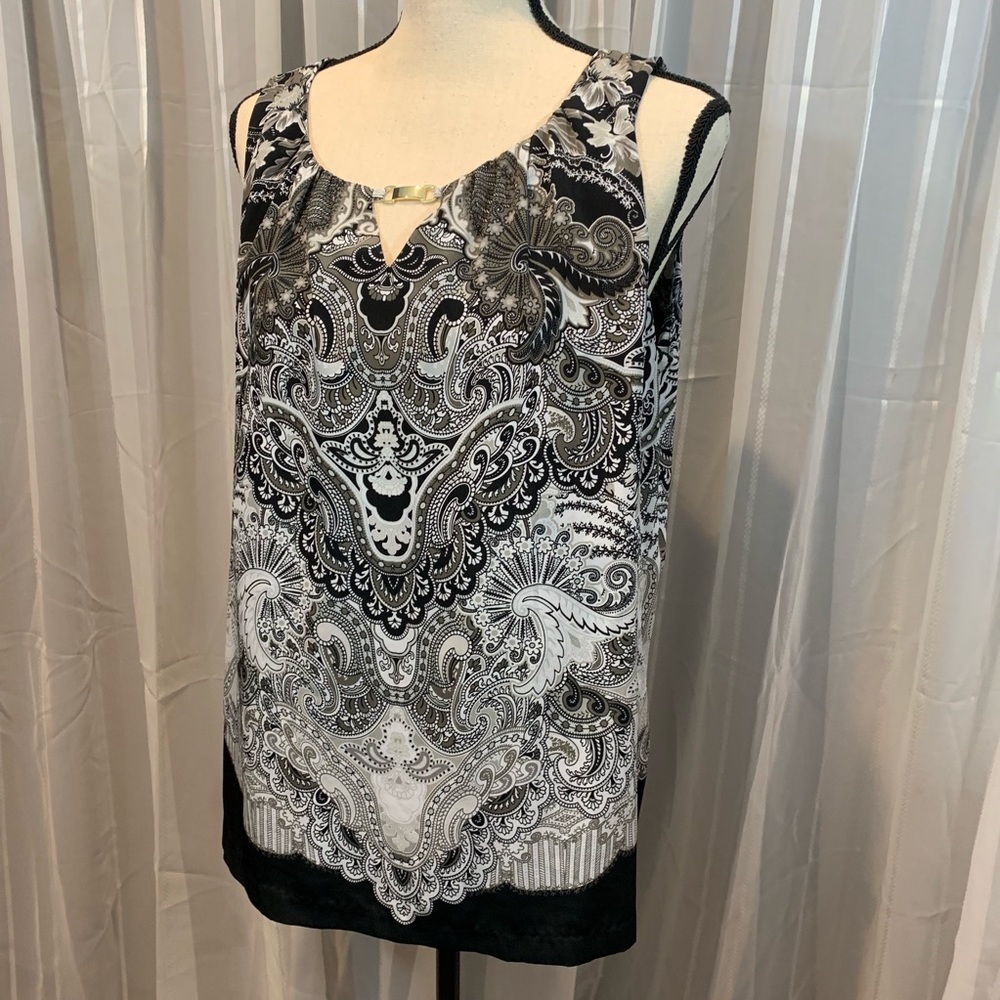 Satin black & white top. Gold color hardware.